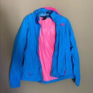 Blue and pink North Face rain jacket.